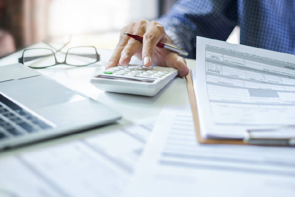 man reviewing financial statements